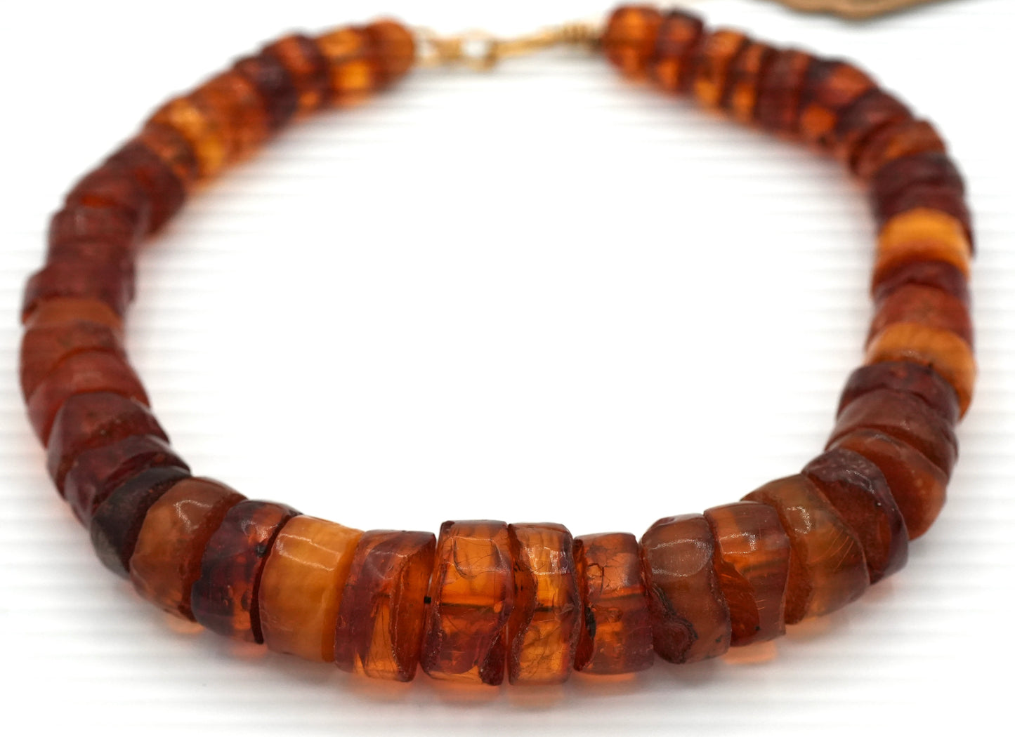 Vintage 60s-70s Graduated Baltic Fossil Amber - Tablet Cut  - Beaded Choker...  Restrung on a synthetic cord with a Rita Okrent Gold Plated Sterling Clasp